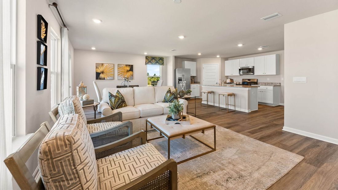 Open kitchen and living room in the new-construction home